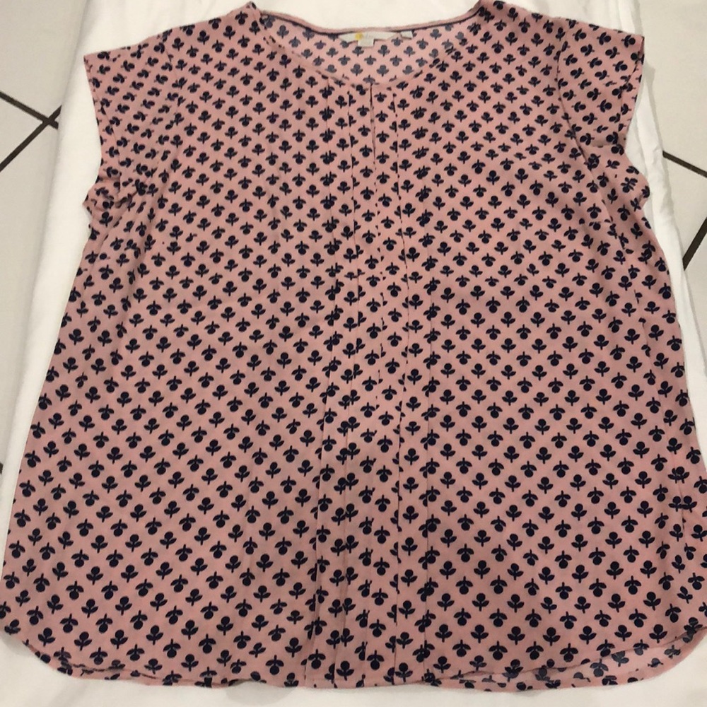 Beautiful blue little flowers. Light pink blouse